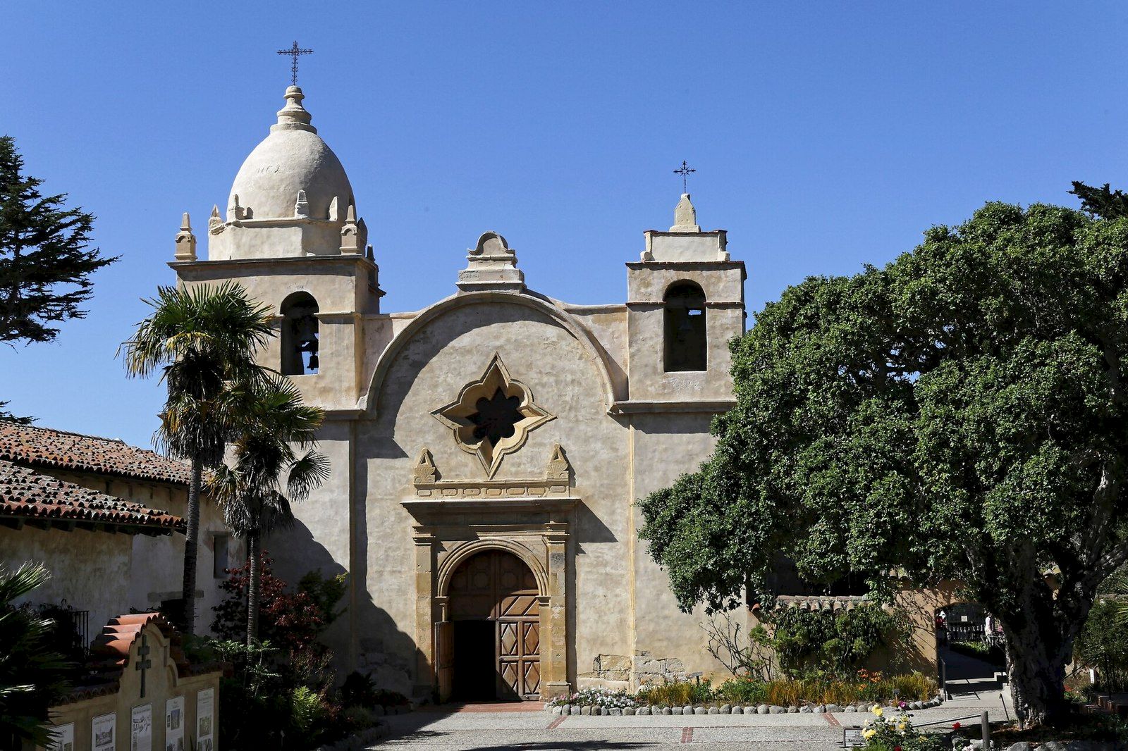 The stone basilica and bell tower of the Carmel Mission